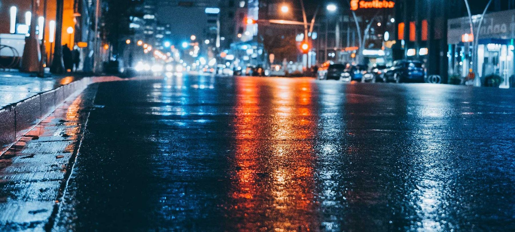Downtown at night, rain on the street